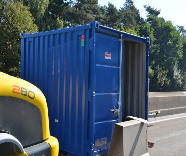 Materialcontainer und Lagercontainer